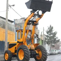 فروش تراکتور بیل لودری عقب رومانی طرح کاترپیلار