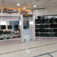 منشی و صندوقدار فروشگاه کامپیوتر آشنا