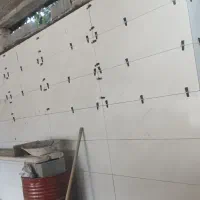 کاشی کاری وسرامیک کف و دیوار موزاییک با تراز لیزری