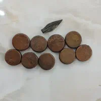 سکه قدیمی با سر کمان قدیمی
