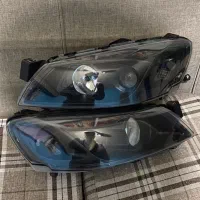 یک جفت چراغ جلو رانا اسپرت مارک کروز درحد نو