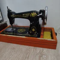 چرخ خیاطی و سی دی