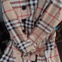 لباس زمستانه شامل پالتو وبارونی و هودی