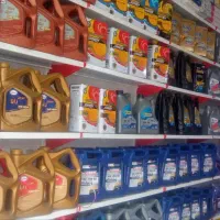 تعویض روغن موتور و گیر بکس اتومات و ضد یخ زیر قیمت