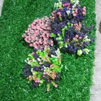 چمن مصنوعی همراه گل مصنوعی
