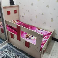 تخت خواب وکمددکوری اتاق کودک