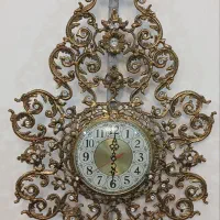 ساعت برنزی خیلی سنگین حدود چهارکیلو