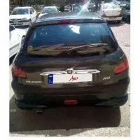 پژو206 ...خودرو یشمی متالیک  میباشد