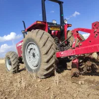 کار با تراکتور جفت شخم  کاشت گندم خدمات کشاورزی