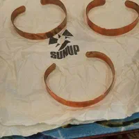 دستبند مسی نو در جعبه با بروشور