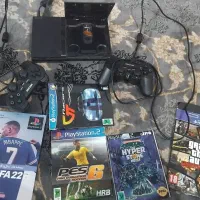 PS2 در حد نو با ۲تا دسته و ۴ تا بازی