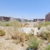 زمین مسکونی پشت تابلو زکات چسبیده به ساخت و ساز