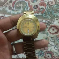 یک عددساعت رادو سویسی بند طلایی