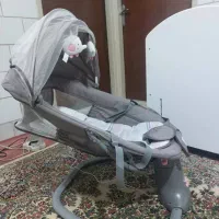 گهواره برقی روروئک ست رختخواب و قنداق فرنگی
