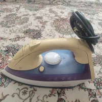 اتو بخار و ساعت