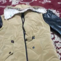 پافر نو کرم رنگ سایز ۴۶ و آجری رنگ در حد نو