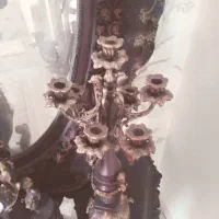 فروش دو عدد شمعدان برنز و ساعت قدیمی