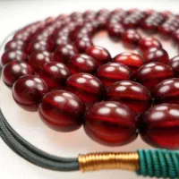 تسبیح کهربا ۱۰۱ عددی سرخ آتشی تراش کمانچه کد ۹۱|بدلیجات|اردبیل, |دیوار