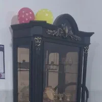 یک عدد بوفه چوبی چهار طبقه