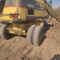 بیل مکانیکی لاستیکی اچ صد 2005|خودرو سنگین|سرخه حصار, |دیوار