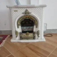 بخاری با زیر تلوزیون