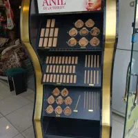 استند لوازم آرایش فروشگاه