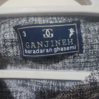 پالتو.مانتو.لباس|لباس|قدس, شهر‌قدس|دیوار