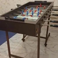 فوتبال دستی تمام mdf تاشو چرخ دار دارای گل شمار
