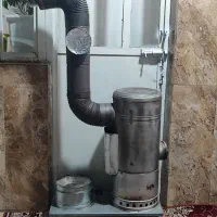 بخاری نفتی بزرگ همراه با لوله های فلزی(بور)