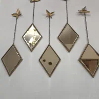 اینه دکوراتیو.جاکلیدی وپروانه های برنجی