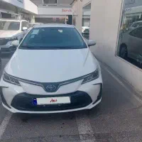 تویوتا کرولا هیبرید 1800 تیپ پایونیر صفر سفید