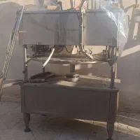 دستگاه پر کن و دربند اتومات مایعات