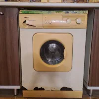 لباس شویی آبسال