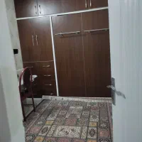 تخت تاشو ب همراه کمد.