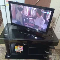 میز تلویزیون شیشه ای