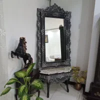 ساعت  ۵۰۰ تومن وآینه ۲۰۰۰۰۰۰ تومن