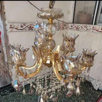 لوستر 9شاخه11شعله استیل طلایی