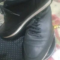 کتانی چرمه طبیعی برتونیکس مشکی دوبار پوشیده شده