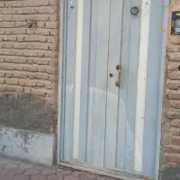 درب آهنی ودرب چوبی باچهار چوب فلزی