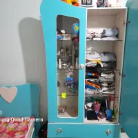 تخت کودک همراه با کمد