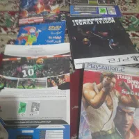 چند عدد بازی پلی استیشن ۲ و یک عدد اسبیگر
