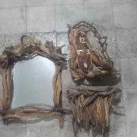آینه و کنسول و ساعت دیواری