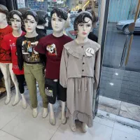 مانکن بچه گانه وعروسکی و تابلو بیرون