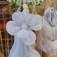 تزئینات مزونی لباس عروس وداماد وکرایه پایه وکالسکه