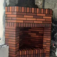 اجرا نمای ساختمان وشومینه و باربی کیو و پشت تی‌وی