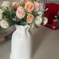 گلدان همراه با گل خارجی