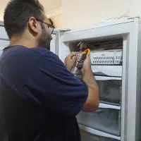 تعمیر یخچال و فریزر در منزل و تعمیرگاه