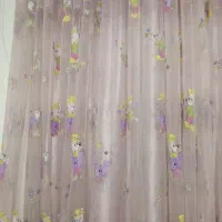 یه عدد پرده صورتی با عکس میکی موز