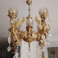 لوستر برنجی شمدان برنجی ساعت برنجی