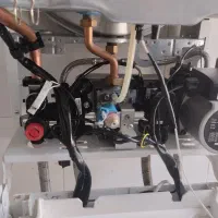 نمایندگی خدمات«پکیجشوفاژدیواری،رادیاتور»بوتان|خدمات پیشه و مهارت|نورآباد ممسنی, |دیوار